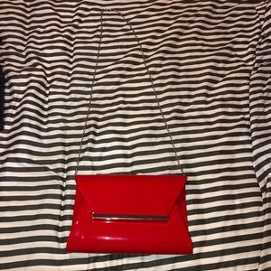Red clutch bag